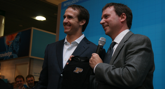 New Orleans quarterback Drew Brees (left) is introduced by Kirk Skaugen, vice president of Intel's Data Center Group. 