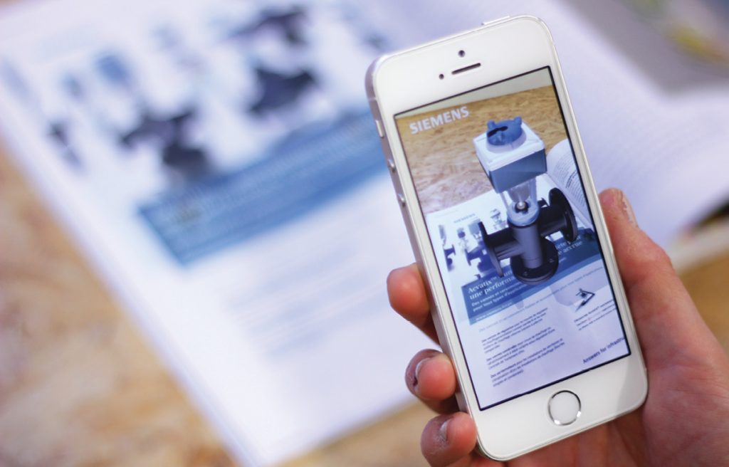Augment offers enterprise augmented reality solutions for retailers and manufacturers. Shown here is a product by the manufacturing giant Siemens virtually imported into a mobile device’s live camera feed via Augment’s app. Image courtesy of Augment.