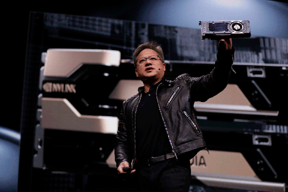 NVIDIA CEO Jensen Huang showcased the new GPU Quadro GV100, based on Volta architecture, at the year’s GPU Technology Conference. Image courtesy of NVIDIA.
